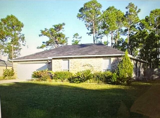 Come see this Bay Pointe Built home in the Woodmont Estates section of Holley By The Sea. Enjoy the large kitchen with lots of cabinets plus a pantry. A new dishwasher and microwave were installed in 2022. An open floor plan gives a light and airy feel and the great room has vaulted ceilings as well as a sliding glass door leading to the open patio. The master bedroom has an en suite bath and a walk-in closet. This home is situated on almost half an acre with a sprinkler system and fully fenced backyard.