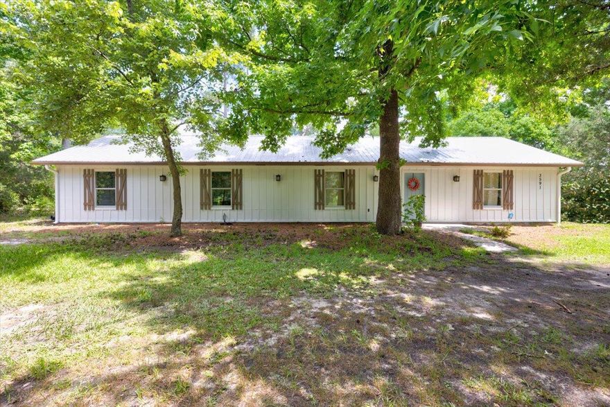 BELOW appraised value!! Back on the market due to no fault of the sellers! Brand new HVAC system was installed this year 2022, metal roof was put on in 2016, and new septic tank was put in 2016. Home has been recently painted.  White exterior, wooden shutters and a light crisp blue door. Enjoy this peaceful ranch style home that is nestled in a country setting with over a half of an acre. This property is only located 2.5 miles from the growing city of Freeport and just north of the beautiful beaches of South Walton. The property offers an open concept with 3 bedrooms and 2 bathrooms. Buyer to verify all data and dimensions.