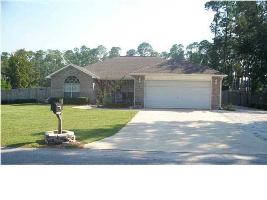 REDUCED PRICE on this PERFECT LOCATION in prestigious Robledal Estates. Family home has split bedroom plan and features a large open Great room with fireplace and separate dining area. The eat-in kitchen has tile floor. The lot is a half acre, privacy fenced, with rear gated access from Hwy 399. There is a rock driveway (through a locked gate) into the large back yard with a metal carport cover for boat or RV storage and a 12x12 storage house. A private boat launch and picnic area are part of the Robledal community; membership is voluntary (for a fee). Don't miss this one! All dimensions and square footage need to be verified by buyer. Listing Broker is related to seller/owner.