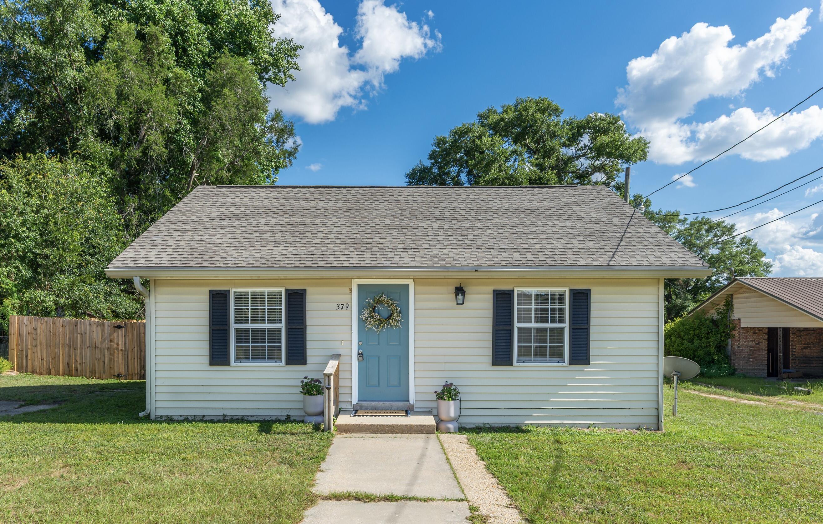 Cute Crestview Cottage with large fenced yard at .23 acre. This home was recently renovated and has all new flooring and paint. Large bathroom featuring a shower with glass door enclosure. Cute, Cozy and ready for a new owner! Roof 2023, HVAC 2014, Water Heater 2017.