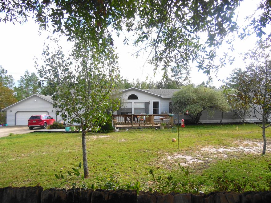 Perfect country location, near I-10 Exchange at Mossy Head. Near Ft. Walton, Niceville, Crestview and DeFuniak...This 1995 manufactured home with 4 bedrooms and 2 1/2 baths is located on 5.3 acres with a creek on the south end of the property. Detached garage, with two rooms for hobbies and more storage in the attic, a detached pole barn/carport with large utility room/storage also. Also an above ground pool with decking and covered sun porch. Backyard is chain link fencing just right for children and pets. So much for $159,500. Property eligible for FHA, VA or Conventional financing.
