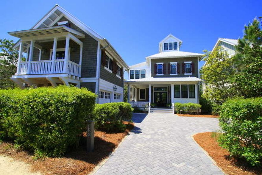 Privacy and peaceful scenery in Phase III of Watercolor! This charming home with Cape Cod flair is nestled on the end of Cove Hollow backing up to a pond with fountain and Western Lake. The home features master suites on the first and second floor, a darling bunkroom and a tower room. Wainscoting and Brazilian hardwood floors are a few of the high level of craftsmanship and finish in the home. An office overlooking the lake, and a separate walk out porch from the first floor master allow you to take advantage of the views and scenery. The open kitchen, dining and living area are great for family gatherings, and open the french doors to the back porch for perfect indoor/outdoor entertaining. The wet bar on the second floor and the tower room with expansive views give you additional