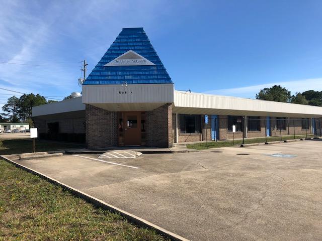 Centrally located in the Fort Walton Beach market, this building was formerly occupied by ChildcareNetwork. The building is in great shape with large open classrooms dividing different age groups,centralized plumbing in the center of the building with multiple restrooms, large kitchen / preparationarea, warm reception area, multiple access doors to the different outdoor play areas. The outdoor playareas are all fenced in and include a swimming pool (which is only 2' deep), basketball courts andnumerous climbing toys anchored in the ground. The building has great visibility and is easily accessedfrom both Mary Esther Cut Off & Freedom Way blvd.