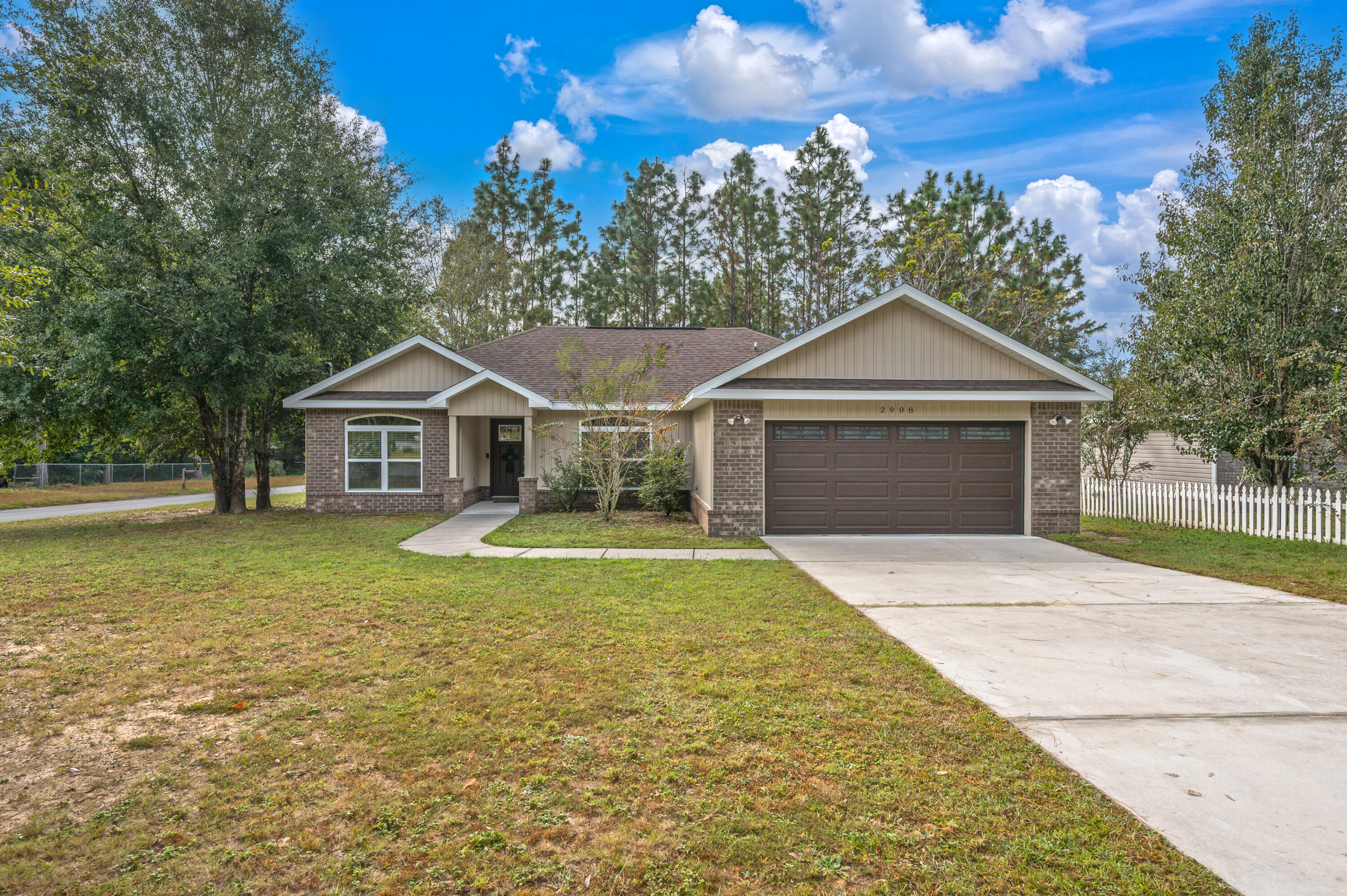 Great home on a corner lot centrally located in Crestview. This 4 bed 2 bathroom split floorpan home has a great open floorpan and is on .37acres. Living area has vaulted ceilings with tray ceiling in the master bedroom. You will love the rustic flooring in the kitchen and wet areas and stainless steel appliances. New AC 2020. Call today to schedule your showing. Water softener system, ring doorbell, washer and dryer do not convey
