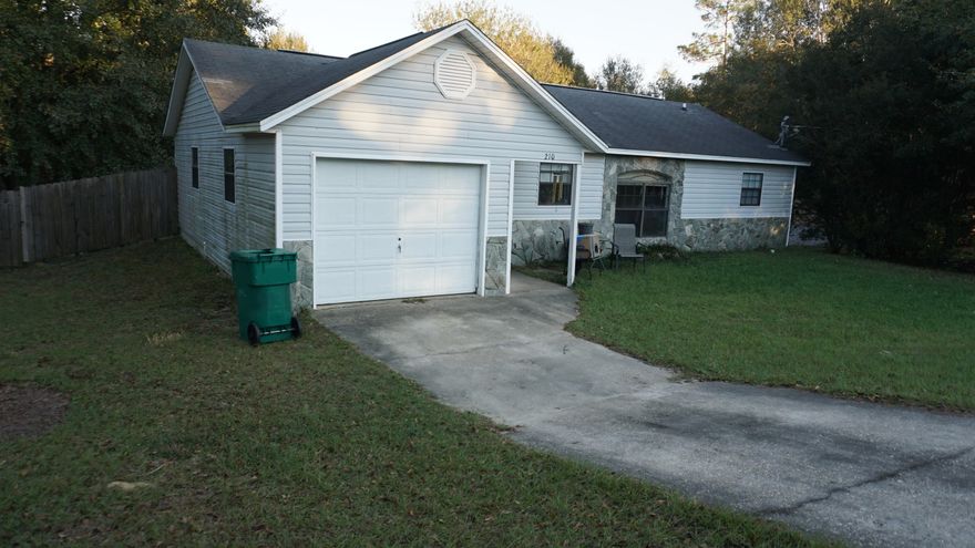 Short Sale. South of I-10. Property backs up to a wooded area. This is a split bedroom floor plan with a galley kitchen and a separate dining area. Sliding glass doors open to a raised deck and a great view of the fenced back yard