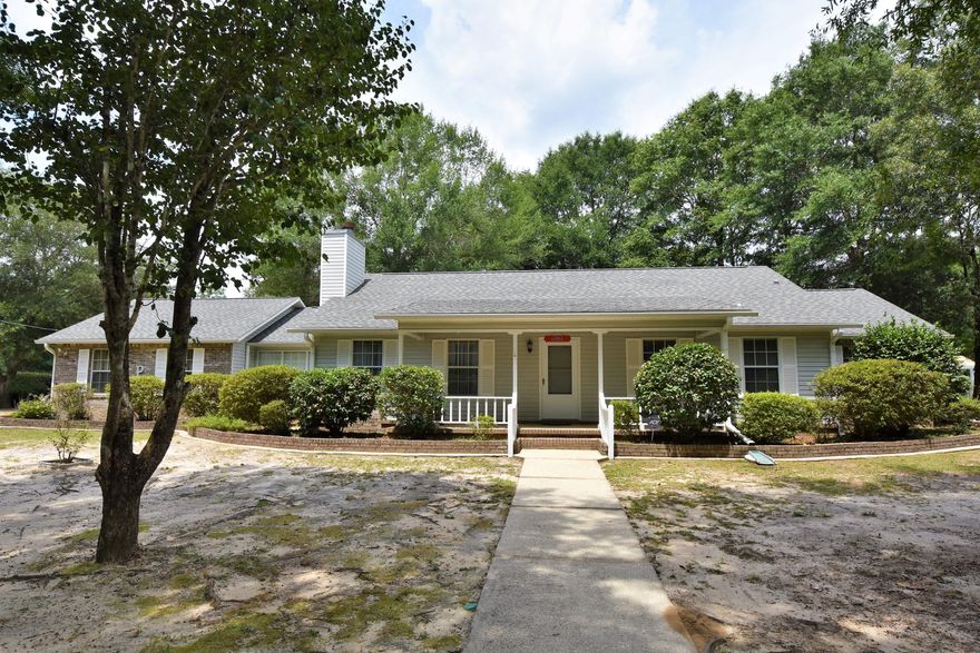 Get away from the traffic and close to town! 1 Year Home Warranty provided by Seller! ONE ACRE, RV Pad w/utility hookups, Work Shed w/a detached 2-Car Carport, Rockin-chair Front Porch, FLORIDA ROOM, Shady oaks accent the landscape, and MUCH MORE! Enter the tiled Foyer, spacious Living Rm and continue to the Dining area that opens to the Florida Rm (not incl in SF). Fully equipped Kitchen w/all stainless steel appliances. Family Rm has 2 doors to the oversized 2-Car Garage. The Master Bedroom has a walk-in closet and oversized shower. Use Bedroom 2 as a 2nd Master BR-it has access to the 2nd full Bathroom, with the cultured marble garden tub. Enjoy peaceful living with stately homes in the neighborhood. Oversized 2 Car Garage has pull down stairs, a large workbench, and a utility sink.