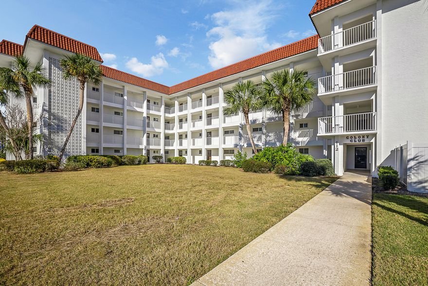 Great second home or primary residence. This 1-bed/1-bath condo has been completely renovated. Kitchen features granite countertops, Martha Stewart cabinets, black appliances, shiplap ceiling and updated electric panel. Tile flooring throughout the entire unit and enclosed balcony with floor-to-ceiling glass windows rendering expansive views of the Holiday Golf Course, ponds, and community pool. This unit is being sold unfurnished and is conveniently located in the center of the building close to the laundry and elevator. The complex is just around the corner from restaurants, 4-minutes from the beach and 2-miles from Pier Park. All measurements are deemed correct, buyers should verify if they are important.