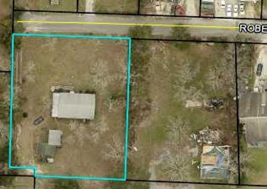 .57 ACRE LOT NEAR THE CORNER OF ROBERTS AND LEWIS TURNER.