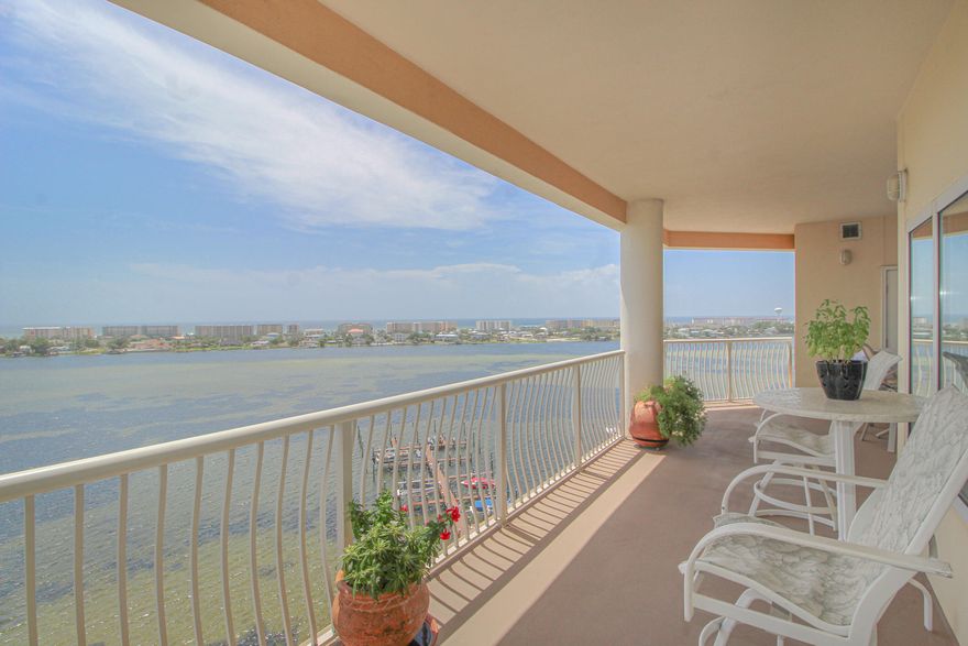 WATERFRONT HOME ON THE SOUND WITH TWO STORAGE UNITS - This beautiful END UNIT stands out above the crowd and captures the real definition of ''LUXURY and COMFORT''.   Upgrades galore throughout this well designed open and spacious floor plan makes for personal enjoyment as well as lots of space for entertaining.  The living area and master bedroom are surrounded by balconies offering panoramic views of the sound and the Gulf of Mexico.  Dining area has an elegant touch with trey ceiling and water views.  The gourmet kitchen is an extension of the living area and features beautiful granite counter space, upgraded appliances to include a convection oven, large pantry and breakfast bar and designer pendant lighting.  Waterfront master bedroom has trey ceiling and large custom walk-in closet. Master bath features extended double vanities, large whirlpool tub, separate shower and toilet closet.  Two additional bedrooms each with their own bathrooms.

This unit features new water heater replaced in 2019,  HVAV system replaced within the last year and half.  New dishwasher, kitchen cabinets have been upgraded and the microwave is also a high end convection microwave.  You will be impressed with the designer light fixtures and ceiling fans throughout the unit and the classy touches of beveled mirrors, faux painted columns, custom made draperies and accented tray ceilings.  The master bedroom closet is a must see, custom built by Closet Solutions to perfection, with the ability to easily be rearranged to your liking.  This unit has never been rented out and is a one owner property. Pride of ownership shows throughout. The building at Presidio is very private from your two car garaged parking spots to the enclosed heated and cooled carpeted hallways with elevators that take you to your paradise with a 10th floor view. The location enables the lucky owner to watch the fireworks on the sound and just about every surrounding town on the 4th of July. This is an unparalleled property in a prime location that you will enjoy year after year with family and friends.

Note: This condo does not include a boat slip, but one can be purchased.

Other amenities include a beautiful community pool with views over the sound, a fitness room with lots of updated equipment and a media room where the family can each sit in their own lazy boy and view a movie on the large screen. It also has a guest room owners can rent for a very small fee.
its.