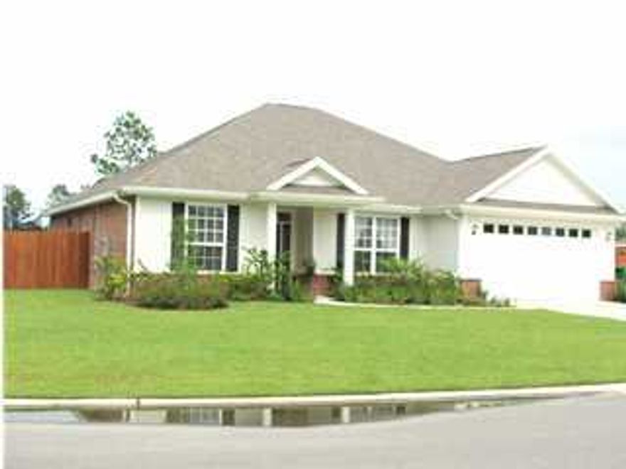 This 4 bedroom/2 bathroom home offers many wonderful features that are above the standard. Located in the lovely Shadow Pines, a Key Lime Homes development, the location offers the convenience of being on the south side of I-10,only a few minutes from the bases (many pilot neighbors), beaches and grocery stores. . The kitchen with 36'' raised panel cabinets, crown molding on upper cabinets, solid surface countertops, kitchen sink in kitchen island with breakfast bar overlooking the great room. The floor plan offers an easy fluid design with kitchen, breakfast nook and great room that open up to each other making entertaining a breeze. Some other features are the separate shower, jetted garden tub, pre-engineered roof trusses with 140 mph wind load and a multi zone irrigation system.