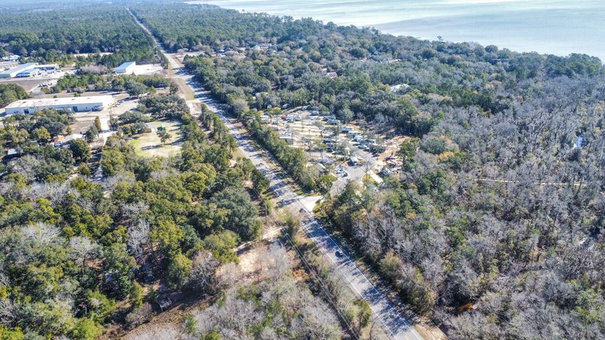 A large 1.8 acre parcel that features Trout Creek running through the West end of the property, and a pond just over the North side of the lot! Build a beautiful home looking over scenic water views, with the convenience of being just outside of town. A survey and wetlands map is available.City Water, and electric is available, and septic is required.Seller Financing Available!