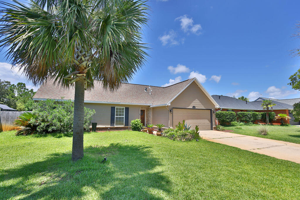 Welcome to your tropical oasis in Mary Esther, FL! This stunning 3-bedroom, 2-bath home offers the perfect blend of comfort and functionality. Step into a spacious living room with soaring vaulted ceilings, flooding the space with natural light. A cozy loft office overlooks the main living area, ideal for working from home. The lushly landscaped backyard is a private paradise, featuring a sparkling pool and a separate 1-bedroom pool house--perfect for guests or rental income. Parking for your RV or boat adds convenience and versatility. Pool furniture and umbrellas stay with the home. Enjoy Florida living at its finest, just minutes from beaches, shopping, and dining. Don't miss this rare gem--schedule your showing today!