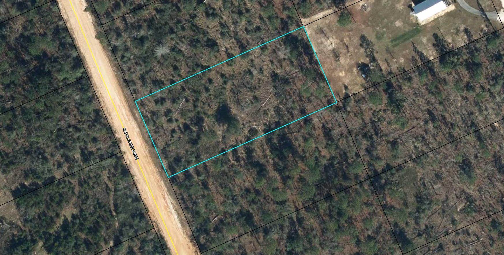 Large 1.148 acre lot in Compass Lake in the Hills. There is a voluntary HOA of $135 a year, but what a great price for all the amenities that are included such as: access to 2 lakes for fishing, tennis, horse stables / riding, rental cabins, RV spots, boat rentals, clubhouse, and a golf range. Being an all-sports lake, enjoy water skiing, tubing, jet skiing, boating, sailing, kayaking & swimming. No need to worry about lunch while out on the water when you have a boat accessible shoreline restaurant. This location is great for someone who enjoys nature and a short drive to the beach since it is located half way between Panama City And Dothan. The area is rich in historical significance, with many restored antebellum plantation homes open for tours or as bed-and-breakfast