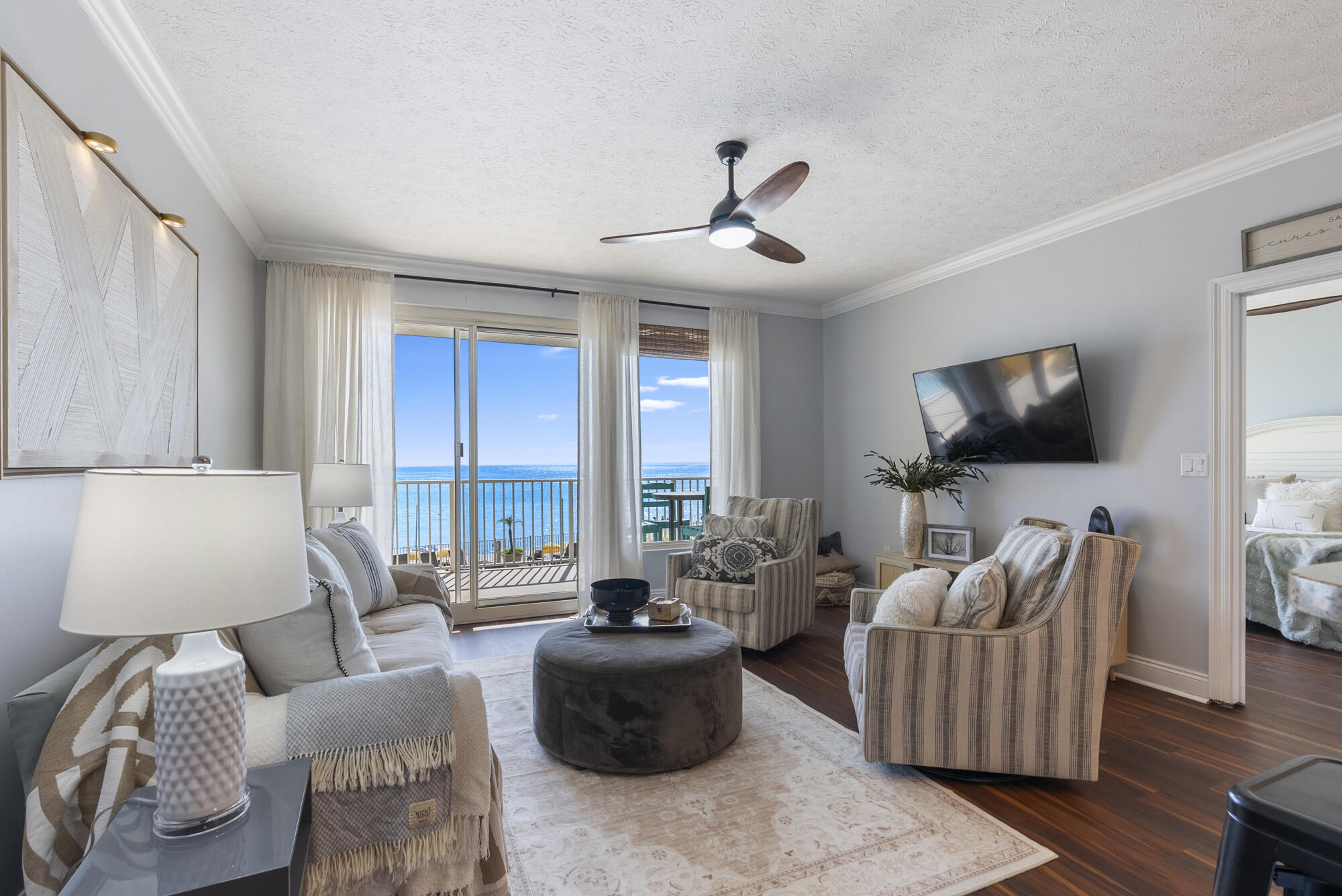Discover A RARE, NEWLEY RENOVATED absolutely stunning condo at Treasure Island Resort with SECOND Floor Gulf Front Views! This breathtaking, completely renovated condo comes fully furnished for a perfect home, vacation getaway, or investment property. Brand new flooring throughout, new kitchen appliances, new door hardware, new light fixtures, new paint throughout, new drapes (the list goes on) and over the top furnishings, professionally decorated, makes this unit the GEM of Treasure Island. This 2-bedroom, 2-bath stunner even has a bonus set of built in bunk beds to maximize space and rental income. The open-concept kitchen boasts beautiful stone countertops, updated stainless kitchen appliances, and everything you need for cooking -- truly turnkey at its finest. MUST SEE IN PERSON!