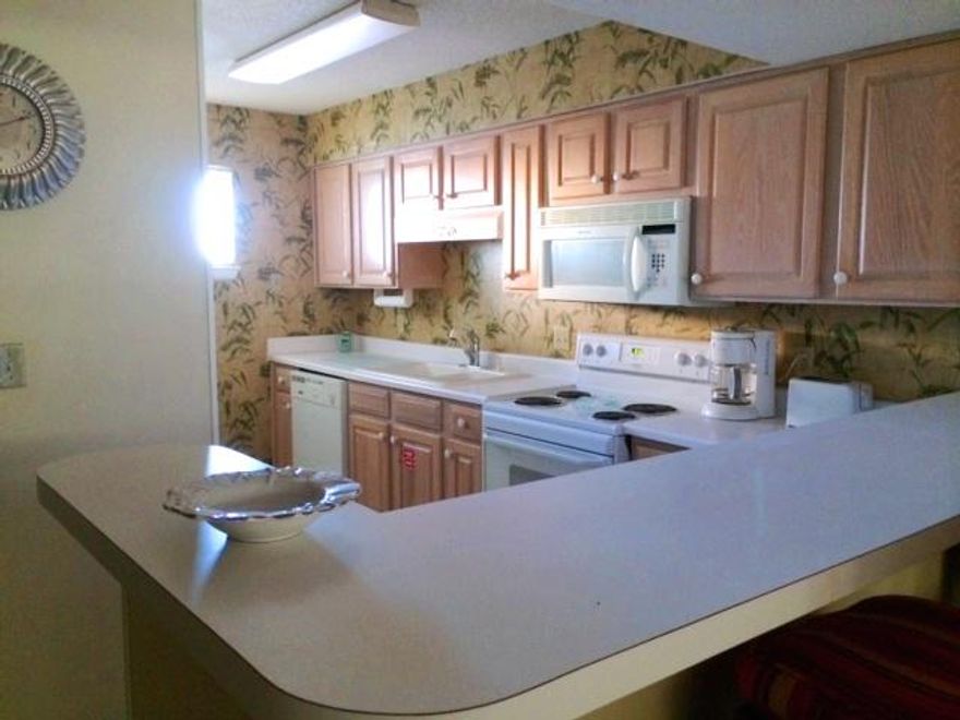 Enjoy Gulf views from your balcony in this beautifully decorated beach condo. Freshly painted, this unit has not been on any rental program. Seller has maintained this unit for personal use. Some of the fixtures and faucets have been recently updated. The carpet is newer and all appliances match! Blinds in the master and guest bedrooms are thermal and room darkening. Enjoy long walks on the sugar white sand of Okaloosa Island and watch the kids splash in the sparking pool. Close-by and local activities include: mini golf, Gulfarium, Okaloosa Island Boardwalk with restaurants, shopping, and fishing pier. Rental projection for this 2 bedroom unit is $27K.