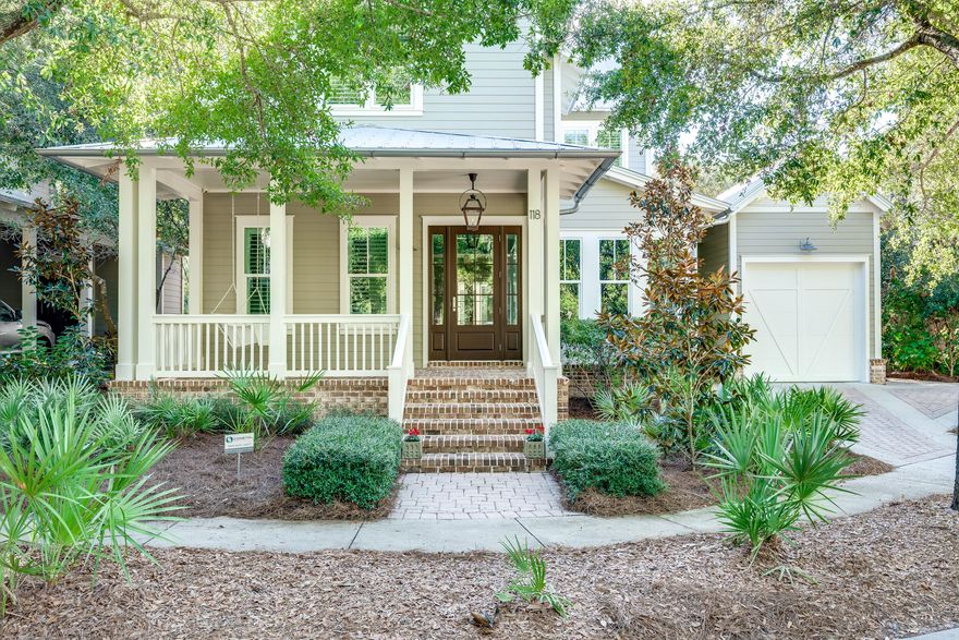 Step into luxury with this meticulously designed 4-bedroom, 4.5-bathroom residence, located in the gated community of Forest Lakes. As you approach the home, you're greeted by a welcoming open front porch with a charming porch swing and gas lantern. The Hardiboard siding of the home beautifully contrasts with the brick detailing on the front porch.

Upon entering the grand foyer, your eyes will be captivated by the pecky cypress accent ceiling and shiplap walls, which set the stage for the home's refined aesthetic. These elements are beautifully complemented by engineered hickory wood floors that flow gracefully throughout the residence, all framed by tall baseboards and crown molding. Flow seamlessly into the formal dining room, where you'll find a ceiling adorned with pecky cypress beams and state-of-the-art surround sound, perfect for dinner parties. The gourmet kitchen is a chef's dream come true, boasting high-end Thermador appliances including a dual-fuel oven with a 6-burner gas range, refrigerator, dishwasher, vented hood and pot filler. The kitchen, enhanced by boxed cypress beams on the ceiling, earth-toned subway tile backsplash, ambient under-cabinet lighting and elegant ebony leathered granite counters, add layers of sophistication, complemented by an abundance of soft-close cabinets and drawers. The large island, distinguished by a unique shade of granite, houses a wine fridge and a drawer-style microwave. Adjacent to the kitchen, the living room also features boxed cypress beams on the ceiling and a floor-to-ceiling bricked gas fireplace. A Sonos sound system and surround sound are integrated for an immersive experience. A conveniently located central vac access and an advanced security system are situated near the kitchen and living room for your convenience and peace of mind. The home's connectivity is further optimized by Wi-Fi mesh extenders located throughout the home. Located between the kitchen and the garage access, the mudroom offers a separate entrance and features shiplap walls, a built-in bench, and ample storage, acting as a functional transition space. Step out onto the screened brick back porch, a serene space complete with drapes, a ceiling fan, and surround sound; perfect for year-round outdoor living. The fenced backyard offers mature landscaping, an outdoor shower, and a Green Egg that is ideal for grilling.

Each guest bedroom is a private retreat, complete with en-suite bathrooms and painted wood-finished closets. The first-floor guest bedroom boasts plantation shutters and an adjacent bathroom featuring shiplap walls and a dual-head, walk-in shower. On the second floor, discover two more guest bedrooms, each with its unique bathroom features. The master suite is a sanctuary, featuring a cathedral ceiling and a private screened-in porch. The master bath offers a glass-enclosed soaker tub and walk-in shower, flanked by double vanities with granite tops. A pull-down metal ladder in the master closet provides access to a floored spray-foamed, energy-efficient attic.

The exterior of the home impresses with Hardiboard siding, a durable metal roof, impact-rated glass windows, and a fenced-in yard with mature landscaping. Rain gutters and downspouts are also installed for effective water drainage. Parking is a breeze with a single-stall garage, an additional parking pad, and driveway space for a third vehicle. Added luxuries include a security system, two AC units, an irrigation system, and a gas tankless hot water heater.

Forest Lakes features a gated entry, two-tiered pool, covered outdoor summer kitchen and playground. This home offers the best of both worlds - luxury and community. Whether you're looking for a family home or a lucrative short-term rental opportunity, this Forest Lakes masterpiece is perfect in every sense.