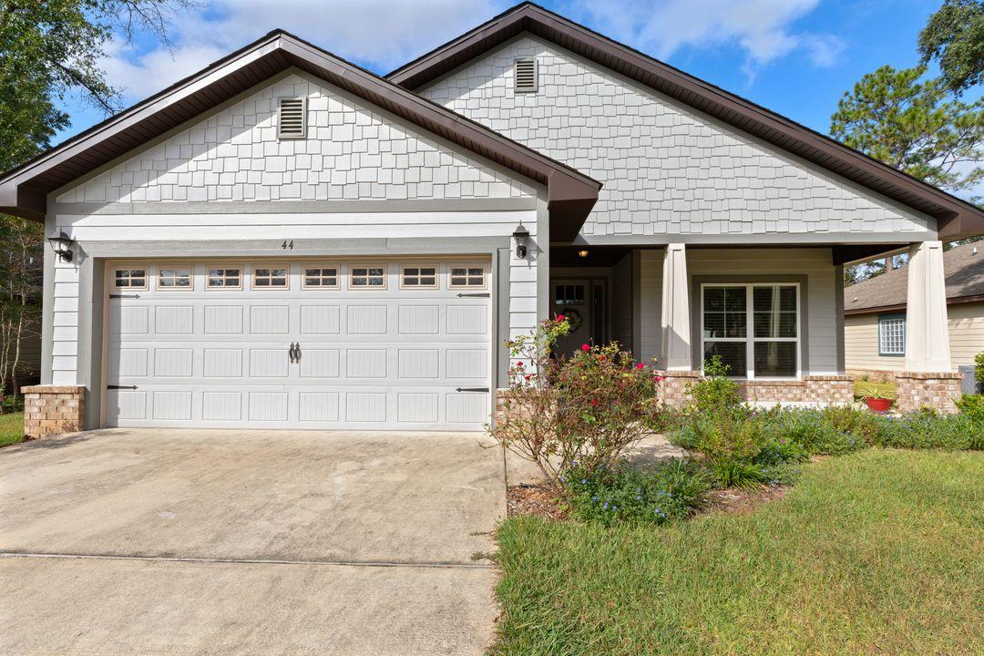 2017 Adams-Built home located in sought-after Canopies of Freeport still under 10-year builder's warranty! Seller to provide survey at closing! 4 Bedrooms/2 Bath brick/hardie board craftsman style home on a .23 acre lot. This one-story home has over 1830 sf of living space,, plus a 13x8 screened porch and a 20x20 2-car garage. Work from home? No problem, front bedroom can be used as an office/exercise room/home school or other. Eat-in kitchen with breakfast bar - beautiful and plentiful wood cabinets with granite counters. Wood laminate flooring in living area, carpet in bedrooms for comfort and sound. Oversided 2-car garage. The owners screened in the back porch and added an open back patio. Spacious level yard with sprinkler system. Community pool and playground within walking distance The Canopies is a desirable community. Private community pool and playground within walking distance of home. Newer shopping centers close by and the beaches of Walton County are only 20 minutes away or hit the road and go north to the countryside also close by. Lots of fishing spots to be found around Freeport and the City has a great recreational facility. Great country food restaurants nearby, too! Freeport is a great place to live! Come for a visit and stay for a while!!