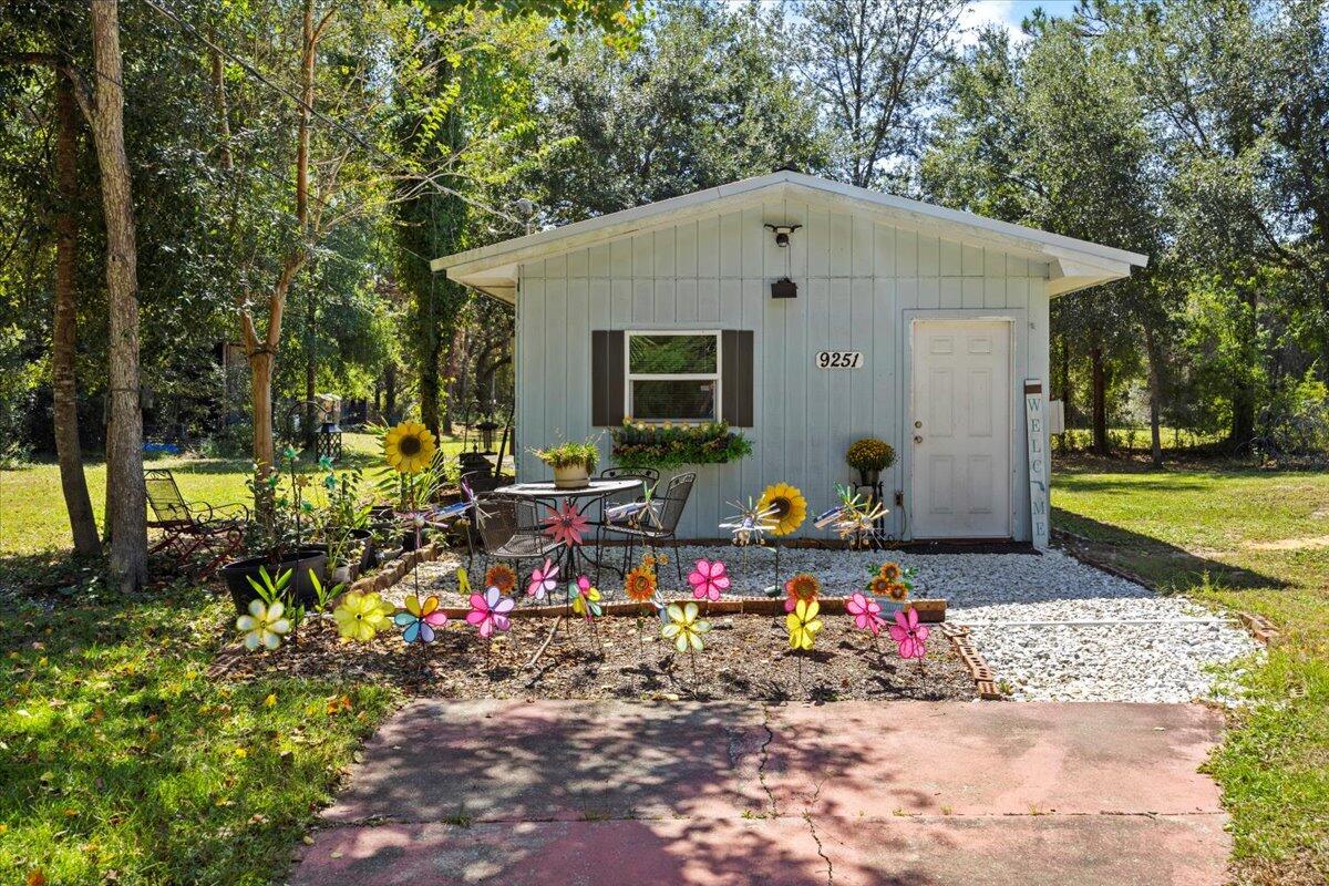 So much potential with this unique bundle of three parcels in the heart of Navarre! This rare opportunity offers a mix of residential and commercial zoning perfect for a wide variety of uses or future investment. The existing residence features a newer roof (within the past 4 years) and offers great versatility: live in it while you build, use it as an on-site office or business space (such as an RV park check-in), or clear it for new development. All three lots are cleared or partially cleared, giving you a head start on your vision.The developed property is equipped with water and sewer, a small cottage and shed with a one-year-old roof. The larger lot includes a four-bay barn. There's an established apiary and Seller can offer mentoring on beekeeping to the buyers if desired.
Located in a non-HOA area, these parcels offer freedom and flexibility. The R1M zoning allows for potential multifamily projects, while the rear parcel, the largest of the three, is zoned commercial, expanding your development options even further.
Whether you're looking to create a homestead, investment property, small business, or mixed-use development, this property is ready to bring your vision to life.