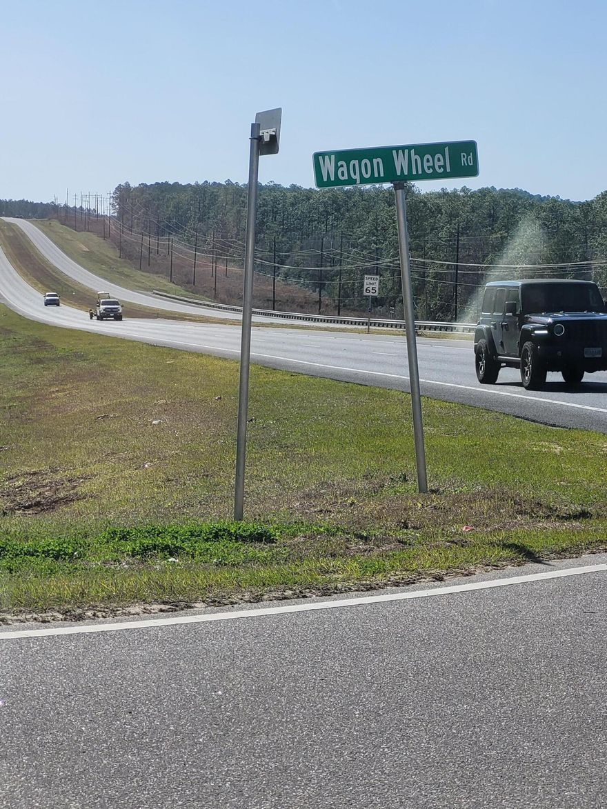 10 mostly cleared acres with over 780 ft of Hwy 331 frontage at the corner of Hwy 331 and Wagon Wheel Rd.  just north of Rock Hill Rd and Hwy 331