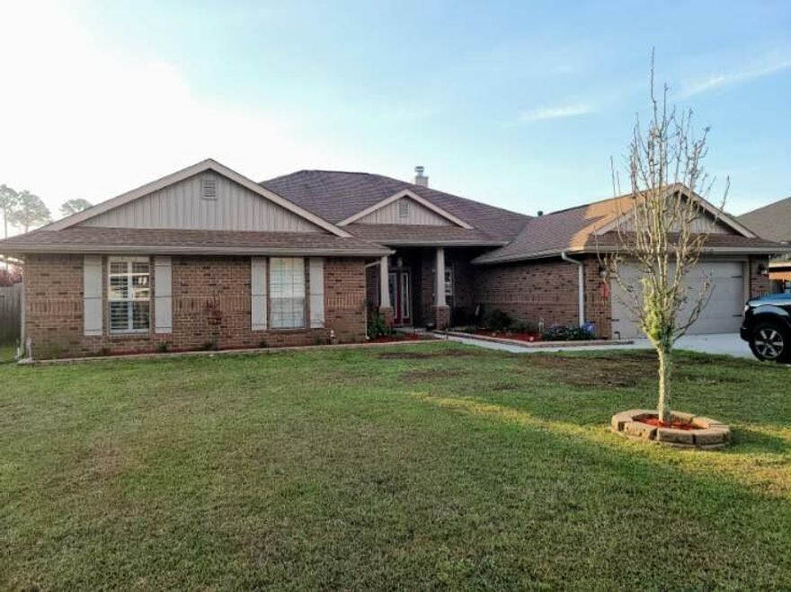 This spacious 4 bed/3 bath home located in Osprey Place offers all the special features you are looking for. Crown Molding, neutral colors, tile floors in all the wet areas and newer flooring through out the rest of the home. Formal Dining Room just off the Foyer. French Doors lead to the office. Over-sized Living Room with floor to ceiling gas Fireplace, is the center of the home. Amazing Kitchen with Breakfast Bar, Cooks Island  Wood Cabinets, Double Oven Gas Stove and Stainless Appliances. Flex area on the other side of the Breakfast Bar can be used as family dining, play room, extra work area. Half bath off the kitchen in the laundry room for your guests. Bedrooms on the other side of the Living room. Master Suite, Tray ceiling, wood floors. Master Bath, Double Closets, Separate tub,