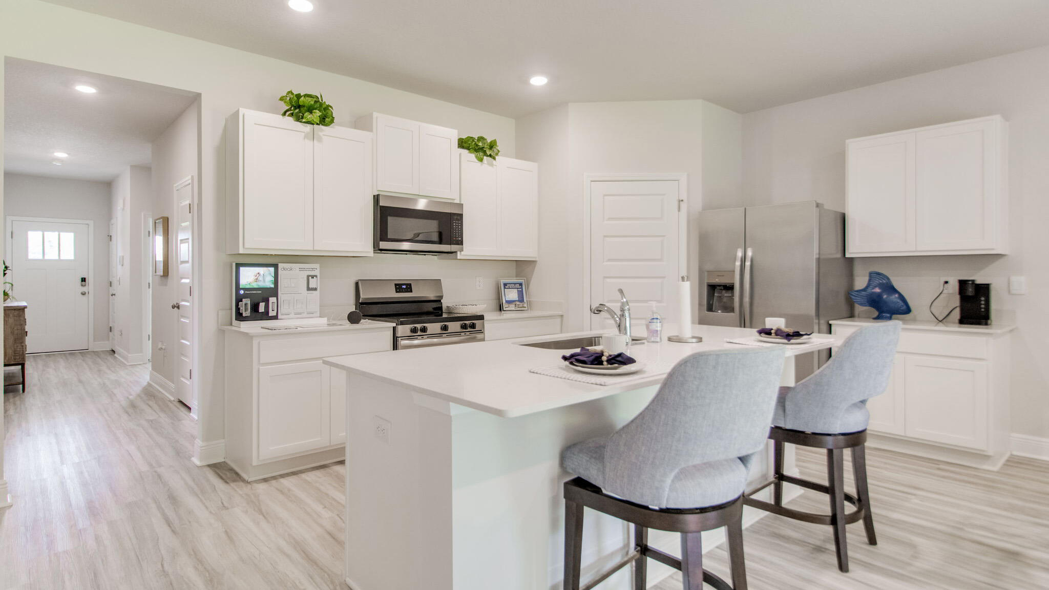 Blackwater Reserve is a NEW community featuring a beautiful community pool, Lazy River and Pickle Ball. The 'BEAU' model is a highly desirable open concept floorplan, 9 ft. ceilings, built-in lighting and a fabulous layout for relaxed living, 4 bedrooms, 2 bathrooms, 2-car garage, covered patio & the 'Smart Home Connect 'System with a variety of convenient Smart Home devices. NICE open living room with the dining area open to the kitchen & living room has lots of windows for natural lighting. A well-designed open kitchen includes stainless steel appliances, a smooth-top range, built-in microwave, gorgeous quartz countertops, quiet dishwasher, corner pantry, island bar, eye-catching wood-look flooring & plush carpet in the bedrooms. Beautiful craftsman curb appeal.