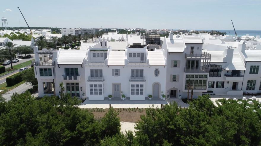 20 Kings Castle Court is prominently located south of 30-A in the pristine community of Alys Beach. This home has a sleek, modern all black and white interior aesthetic and is 4 bedrooms, 4 full baths, and 2 half baths with master suites located on the first and second levels. This home is accented with an open floor plan, courtyard and large pool off the main living area with large bi-fold doors for intimate indoor/outdoor living. The courtyard offers a summer kitchen for outdoor cooking and those incredible fall beach evenings. The home also offers an exceptional roof top terrace with incredible views, half bath, and interior wet bar. 20 Kings Castle Court fronts one of the most stunning and well-known pedestrian walking paths in Alys beach, Turtle Bale park.