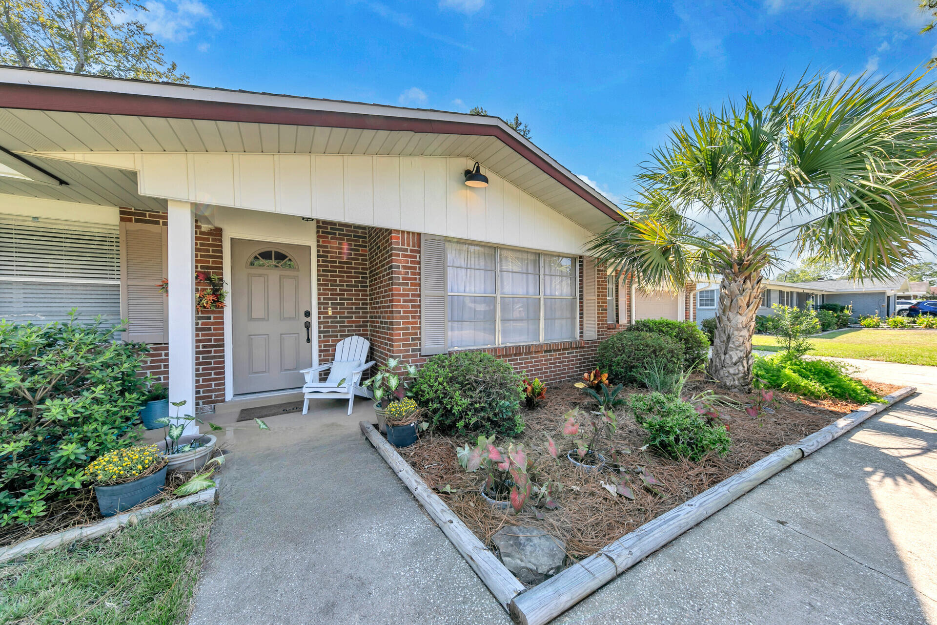 A true gem in highly desirable Poquito Bayou! This all brick, classic ranch-style 3 bedroom 2 bath home has been loved by its original owner and given new life by its second. Now it's your turn to add your story! The layout is spacious, with two separate living areas and a formal dining that is open to the kitchen. The bathrooms are filled with vintage charm and the flooring is a mix of mid-century, warmth with the original parquet  and modern and inviting lvp. Sliding doors lead you to a massive Florida room for added entertainment space. Poquito Bayou is known for the lot sizes and this home does not disappoint! Over a third of an acre and most trees have been cleared so you can get the most out of your yard. A brand new well has been dug and new lawn pump installed. Roof and water heater were replaced in 2022 and the HVAC system was replaced in 2019. All copper wiring! Leo Norred Children's Park is on the street where the voluntary community association hosts parties and events throughout the year. Come down for Food Truck Fridays and give yourself a break from cooking! Half a mile to the Poquito Bayou Boat Launch. Fish, swim or boat off the dock! This location can't be beat!