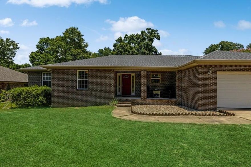 Beautiful neighborhood with No HOA! This clean home with three bedrooms and two bath features a well designed split floor plan with vaulted ceilings.The master suite is large and has an ensuite bathroom with double vanity sinks, a garden tub, a separate shower, and a walk-in closet. The well-designed kitchen has a pantry, new light fixtures, and stainless appliances. Outside is a large covered porch enhanced by an open deck leading to your fully fenced back yard. The property boasts mature landscaping & various fruit trees. The garage is oversized and features an additional storage closet.