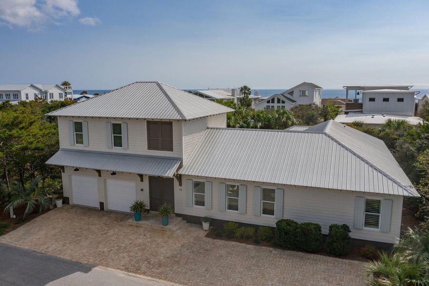 Quintessential beach home in 30A's hottest and upcoming neighborhood.  Homes this close to the beach rarely become available.  Especially, this price and this level of quality construction.  94 Walton Buena Vista was built by Ron Brannon and no detail was spared.  Upon entering the loggia one is welcomed by the professional landscape and open stair way leading to separate sleeping quarters.  The main home consist of travertine flooring, exposed solid cypress beams, ship lap (tounge and groove), and quartz tops throughout.  Please note the main home is one bedroom and has two additional bedrooms for guest in carriage home.  This area can easily be converted under one roof.  Current owner has enjoyed the separation for overnight guest and privacy. 94 Walton Buena has ample parking with a two car garage and is literally steps to the beach.  See pics for details.  This neighborhood is non rental which has become very popular along 30A.  Enjoy the beach, bike path, Alys beach, Rosemary and Kaiya while tucked into your own private oasis.