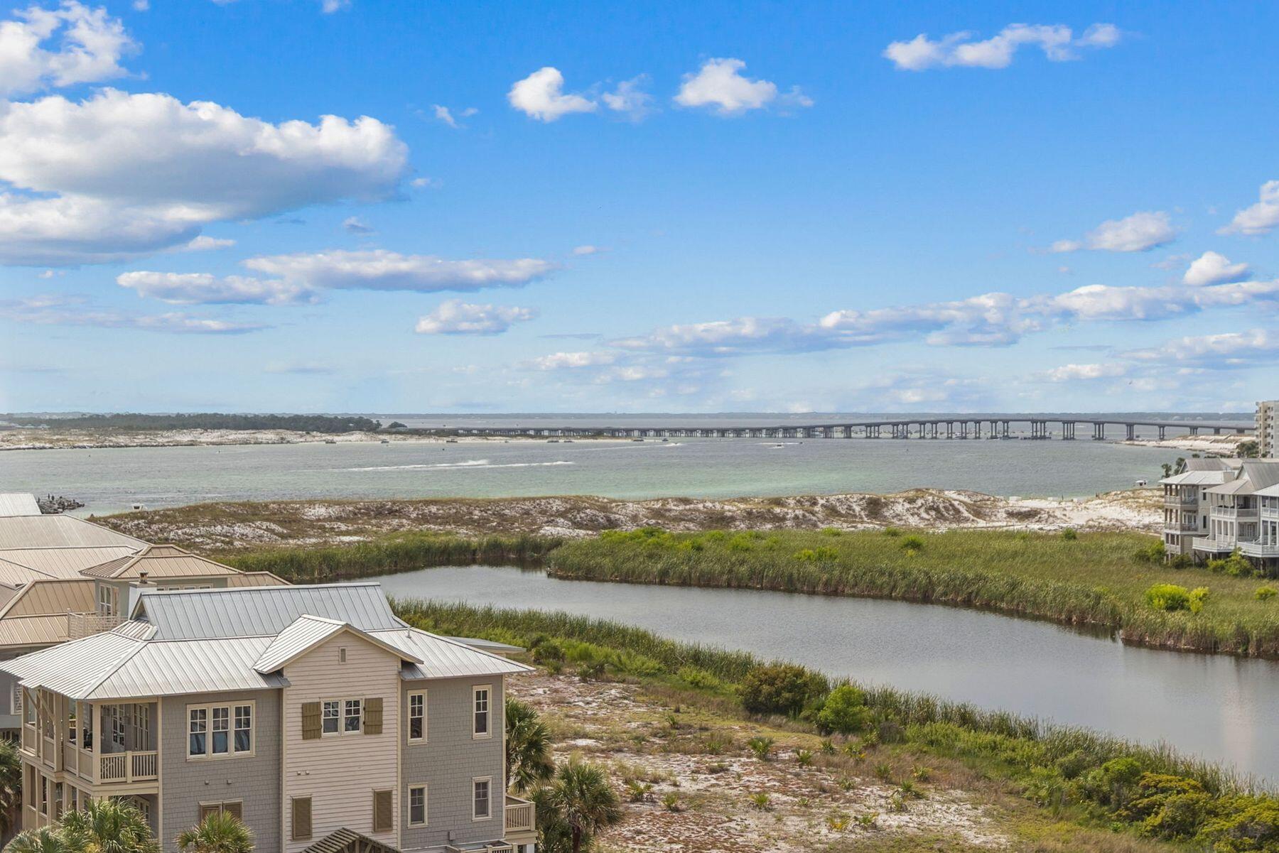 Experience unparalleled living in this stunning 2-bedroom, 2-bath condo at Jetty East, offering some of the most captivating ''sunset side'' views imaginable. From this top floor elevated vantage point, you'll marvel at the pristine beach, the expansive Gulf, the bustling Destin Pass, and the vibrant Crab Island. Imagine starting and ending each day with a masterpiece: serene mornings watching fishing boats in the East Pass and the endless Gulf of Mexico, followed by breathtaking evening sunsets and dazzling seasonal fireworks. A must see - this is the best priced 2 BR condo at Jetty East gulf front! The required Milestone Study and Structural Reserve Study have been successfully completed. Jetty East is a highly sought-after beachfront condominium nestled on Destin's desirable Holiday Isle. Here, you can effortlessly stroll to the iconic jetty to watch boats, snorkel, or fish, immersing yourself in the quintessential Destin experience. The prime location offers unparalleled convenience, with shopping, grocery stores, and an array of restaurants just a stone's throw away. Residents are spoiled with an impressive array of amenities, including 2400 sq. ft. of covered parking, a sparkling pool with a spacious sundeck, a hot tub, a beachside pavilion with charcoal grills, tennis courts, pickleball courts, a fully equipped fitness room, engaging kid's activities, live music entertainment, shuffleboard, an owners meeting room, and 900 feet of pristine sugar-white sand beach. For your peace of mind, Jetty East is a gated community with 24-hour security. Great rental investment, second home or even primary residence!
