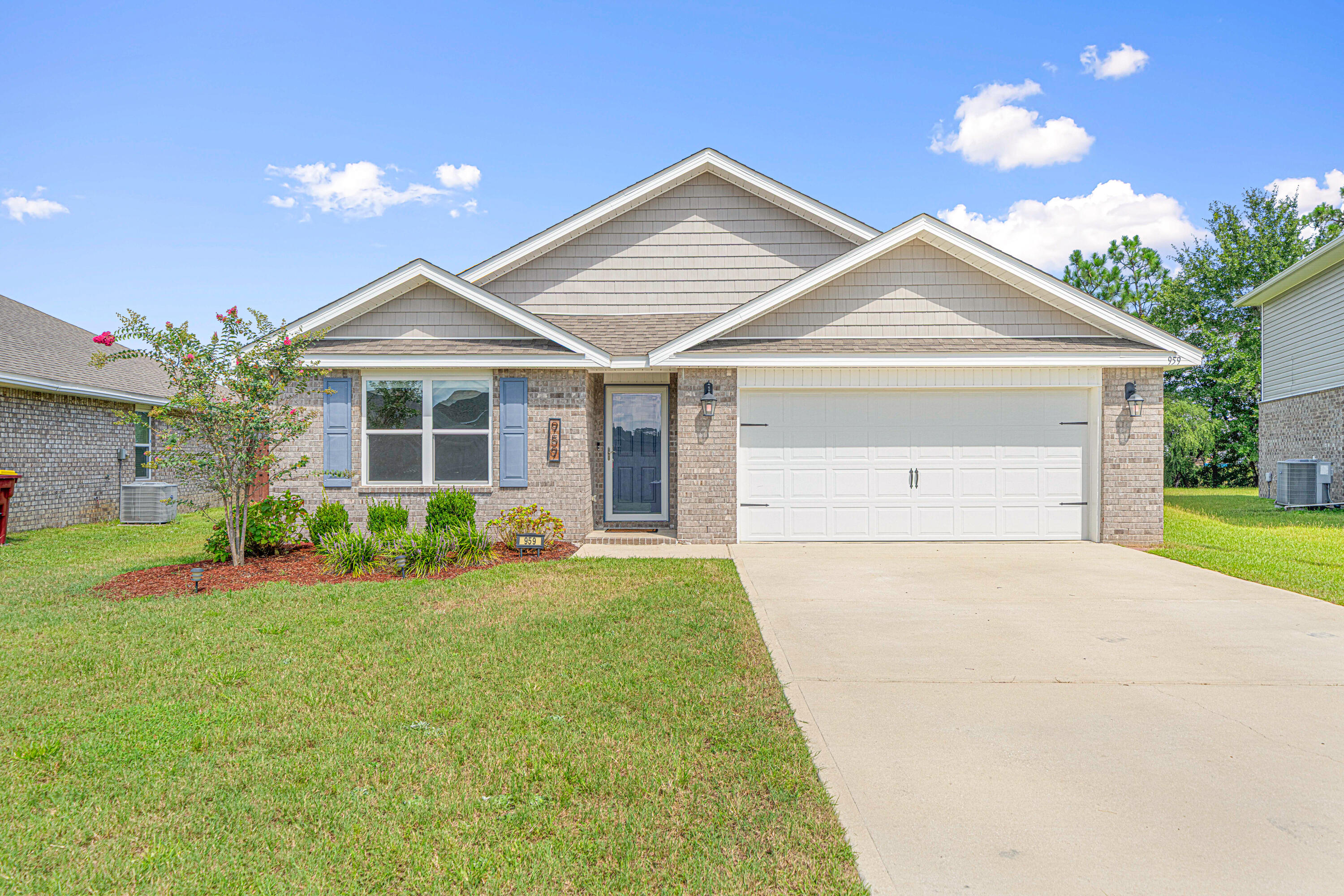 Welcome to 959 Merganser Way in Crestview -- a stunning Cali floor plan featuring 4 bedrooms, 2 baths, a covered back porch, and a 2-car garage. This nearly new home comes with paid-off solar panels, giving you the benefit of low utility bills from day one. The open kitchen boasts an island, stainless steel appliances, and granite countertops, all flowing seamlessly into the great room filled with natural light.Step outside to your covered porch and enjoy the peaceful backyard view -- perfect for morning coffee or evening relaxation. The spacious master suite is privately tucked away, featuring his-and-hers walk-in closets, dual sinks, and a separate shower.Located in a neighborhood with access to a refreshing community pool, this home offers both comfort and fun. Move in, unwind, and start enjoying the lifestyle you've been looking for! Solar panels will be paid off by the seller at closing.