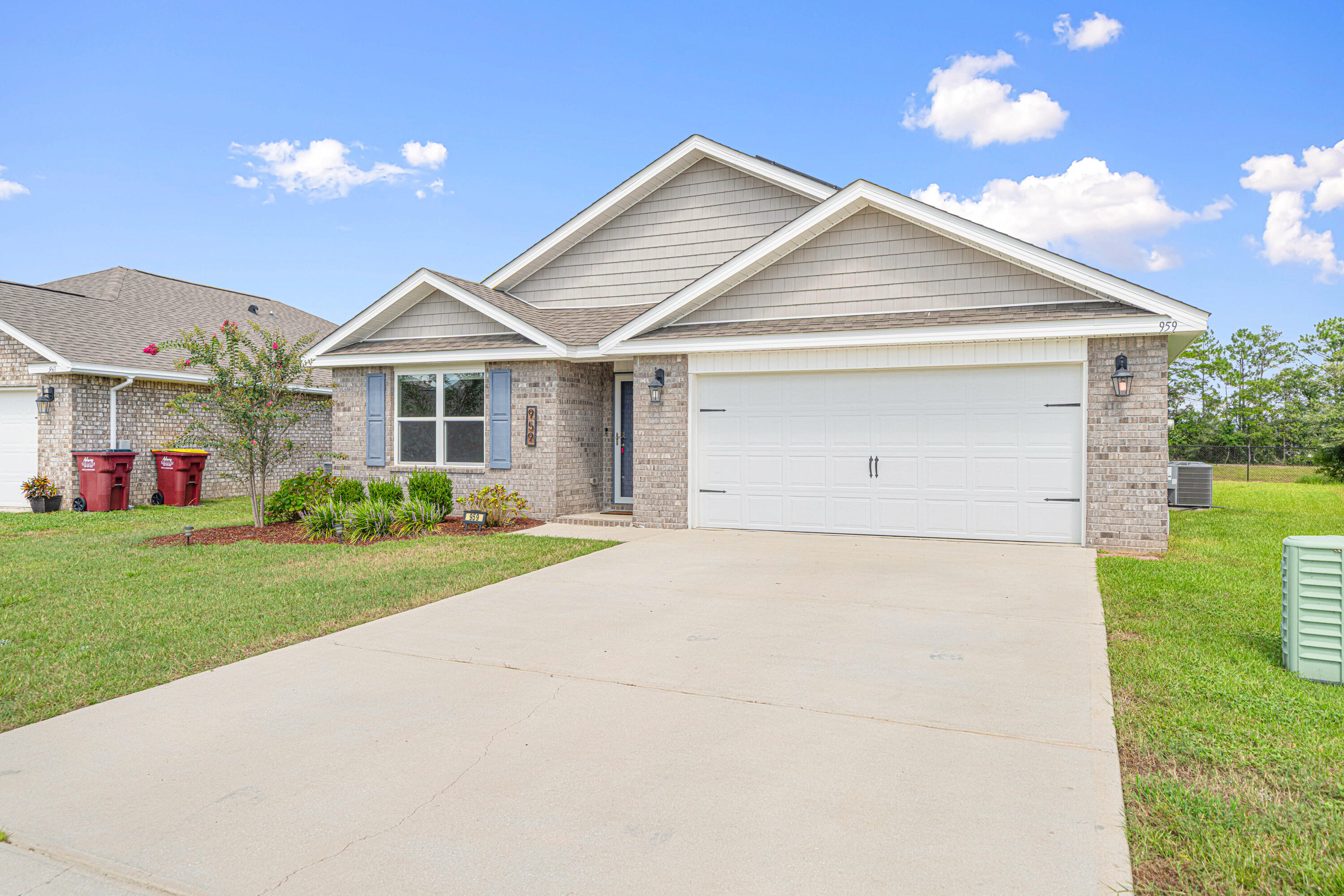 Welcome to 959 Merganser Way in Crestview -- a stunning Cali floor plan featuring 4 bedrooms, 2 baths, a covered back porch, and a 2-car garage. This nearly new home comes with paid-off solar panels, giving you the benefit of low utility bills from day one. The open kitchen boasts an island, stainless steel appliances, and granite countertops, all flowing seamlessly into the great room filled with natural light.Step outside to your covered porch and enjoy the peaceful backyard view -- perfect for morning coffee or evening relaxation. The spacious master suite is privately tucked away, featuring his-and-hers walk-in closets, dual sinks, and a separate shower.Located in a neighborhood with access to a refreshing community pool, this home offers both comfort and fun. Move in, unwind, and start enjoying the lifestyle you've been looking for! Solar panels will be paid off by the seller at closing.