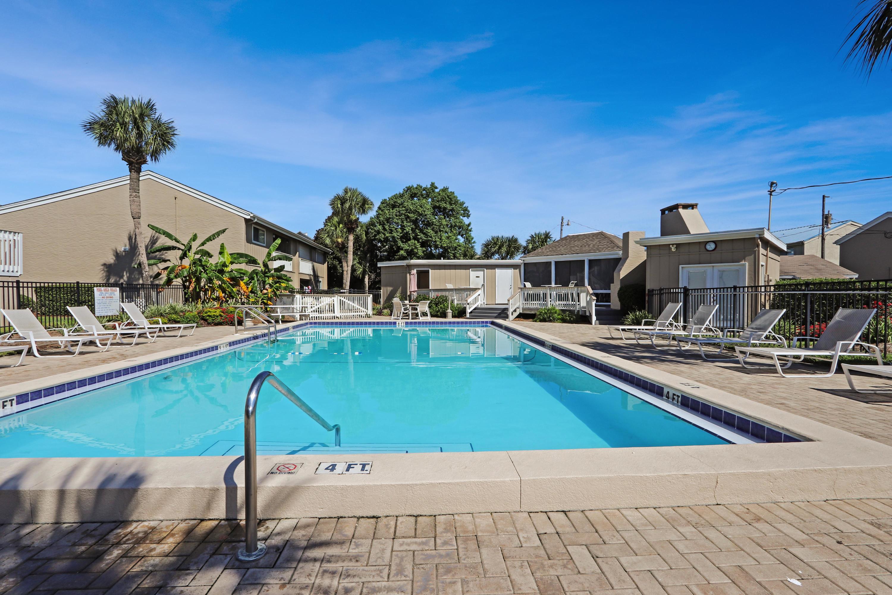With 225' of deeded beach access, Chateau La Mer has the best value in Destin! Incredible amenities include 2 swimming pools, 2 tennis courts, shuffle board, grilling areas and a playground. This 2 bedroom, 2 bath, first floor, corner unit is located at the front of the neighborhood allowing a quick walk to the private beach access. The unit is being sold completely furnished, turn key and rental ready! Snow birds are already booked for 4 months starting December 1st.Gross Rental Figures:2017 $15,552.37YTD for 2018 $18,043.00