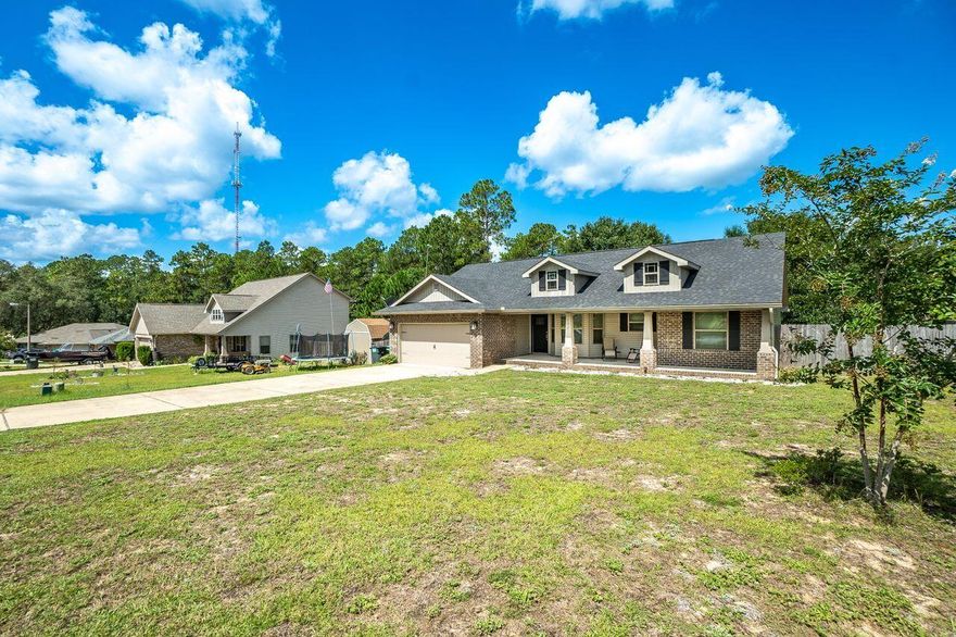 Only 4 Years old! This 3 bd 2 ba wonderfully constructed home can be yours! This popular floorplan boasts an open concept, includes a huge covered front porch as well as a covered deck in the rear of the home. Perfectly located to allow for easy commuting to Duke, Eglin, and Hurlburt! The kitchen shows off a breakfast bar along with stainless appliances, moving on to the main bedroom you will find plenty of space, a dual vanity, a soaking tub, and a separate walk-in closet. The back yard is very large and fully fenced for privacy.