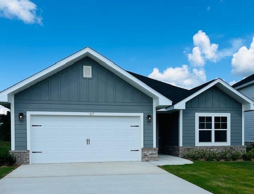 Limited Time Offer: Receive up to $25,000 price discount on this home. Ask about our 3.99% interest rate buy down promotion with our preferred lender. Community also has USDA financing with zero down payment for those that qualify. New Craftsman Style home with brick skirt and hardiboard siding. Approx. 20 mins to Blue Mountain Beach/ 30a . 3 BR / 2 BA with 2 car garage + opener, cathedral ceilings, 8' beautifully crafted front door, large covered patio, quartz countertops, LVP flooring throughout, separate garden tub and shower in Primary Bath. Moen faucets, lever handled hardware, attic with pull-down stairs. *Some photos have been virtually staged to illustrate the property's potential.*