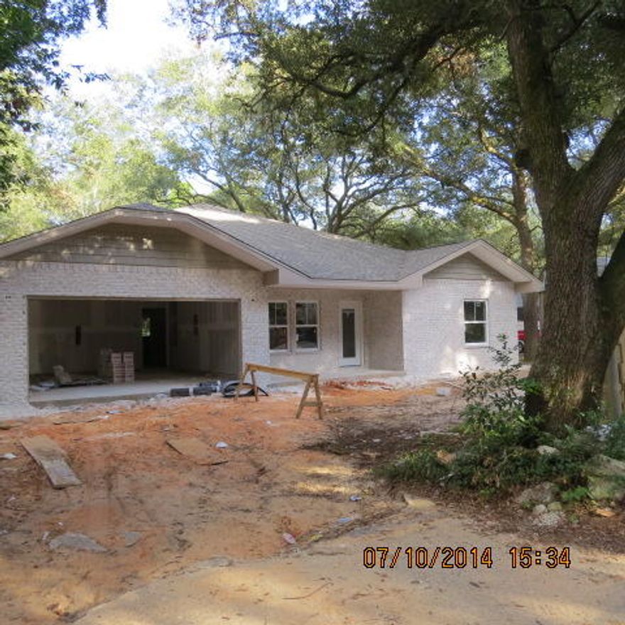 Awesome new floor plan, offered by a multiple award winning builder and Parade of Homes winner! Contract now to choose flooring and countertops. Home is on a large lot with beautiful mature trees which is also in a quiet neighborhood with location, location, location. This 4/3 custom brick plan has super curb appeal. There are 10 ft. ceilings w/ impressive crown molding. There will be hand scrapped hardwood flooring and and 5 1/4'' baseboard throughout the main living areas.