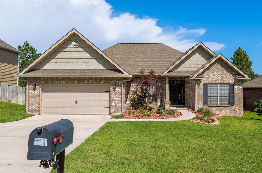 This 4 B/R 2.5 bath all brick home is located on the most quiet & desirable street in popular Rolling Ridge. Pulling up to the house you will see the lush Zoysia grass & great landscaping w/sprinkler system. Walk inside to the large foyer you'll begin to enjoy the new wood flooring & high ceilings. It will lead you to the living room where there is lots of room for entertaining. French doors lead to a large stained deck & private back yard & separate cement slab for grilling. There is a half bath off the living room. Large kitchen with lots of counter space. Walk down the hall to the large master suite with trey ceiling. Master bath has new tile floors, large tub, separate shower, walk in closet and double sink vanity. The other 3 bedrooms are big and roomy with a shared 2nd full bath.