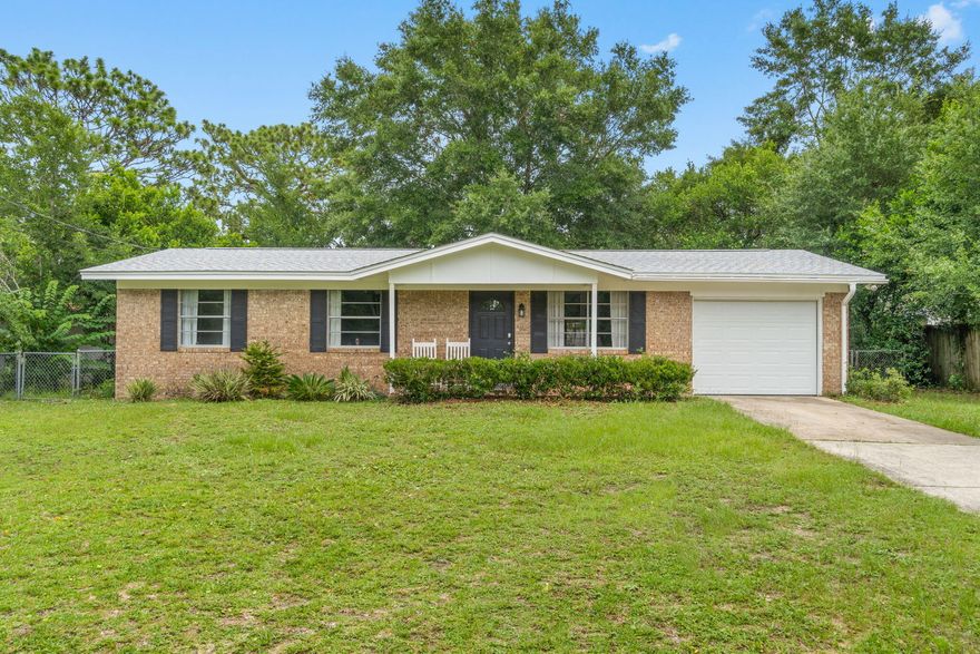 This adorable brick home is one worth seeing! Centrally located in Shalimar, FL right outside the doors of Eglin Air Force Base and minutes from the back gate of Hurlburt Field.  This three-bedroom one and a half-bath lives spaciously. Upon walking through the front door you will notice the open living room with luxury vinyl plank flooring from wall to wall and fresh paint throughout. The fabulous kitchen has been redesigned and remodeled with new cabinets and granite countertops. The home has been outfitted with newer styled light fixtures to add to the modern look. The backyard features a covered porch to add to the shade for cooking out or relaxing. This very well-maintained house has a 2021 roof and is looking for the next owner to love it and create memories with their family.