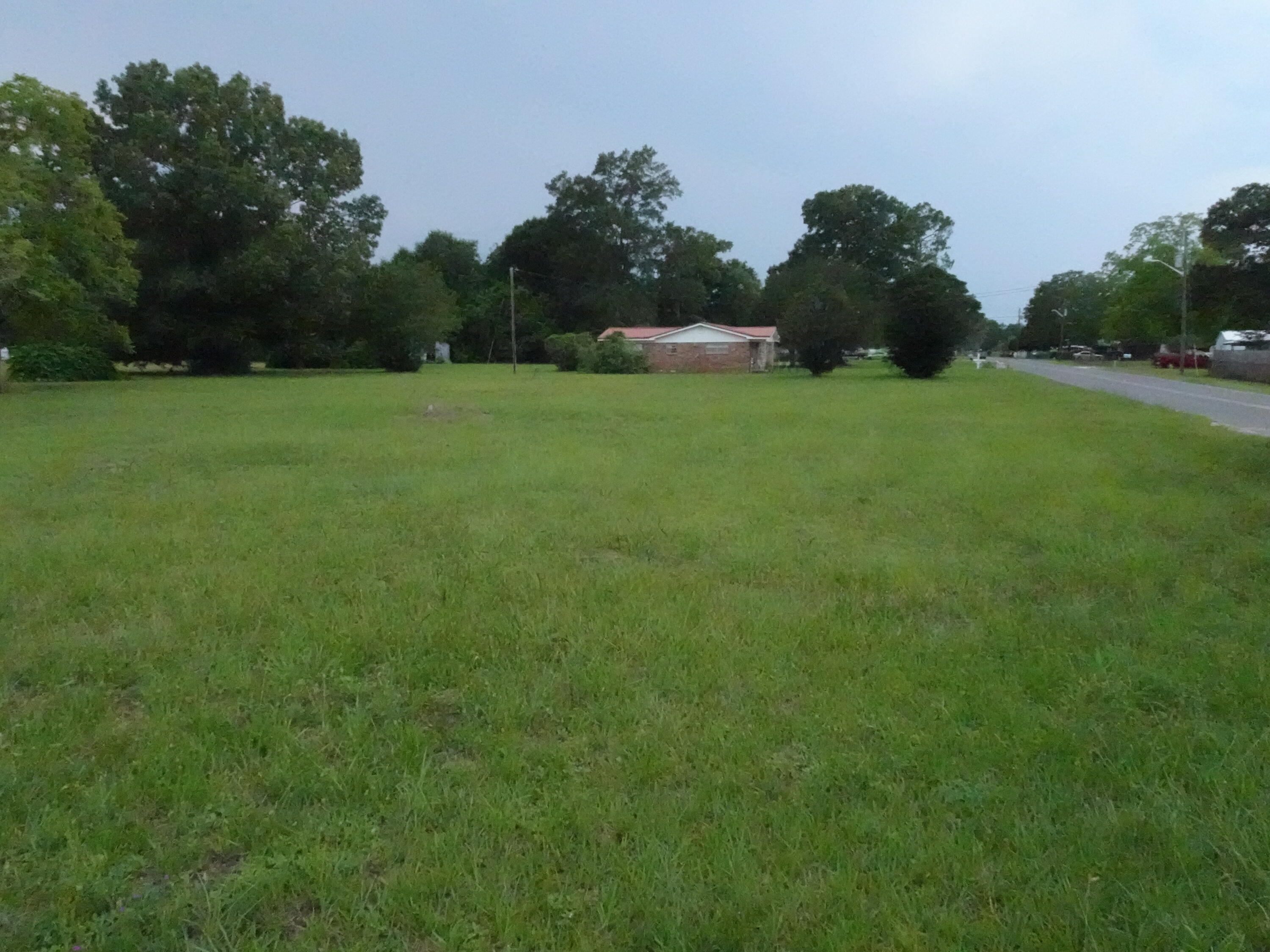 2 level lots located within the City Limits of Paxton. Lot adjoining US Hwy 331 is zoned Mixed use, allowing Commercial Development along the Highway. The second lot is zoned low density residential. Lots are level and cleared. City water and sewer are available with tap fees PAID for at least 1 sewer tap and 1 water tap. Previously a mobile home was there. Excellent location for a small business or a home business. Few lots available in Paxton like this!!! Located near the school and on the corridor driving to South Walton and the Beaches. Lots are a very short distance to Lake Jackson for recreation water sports.