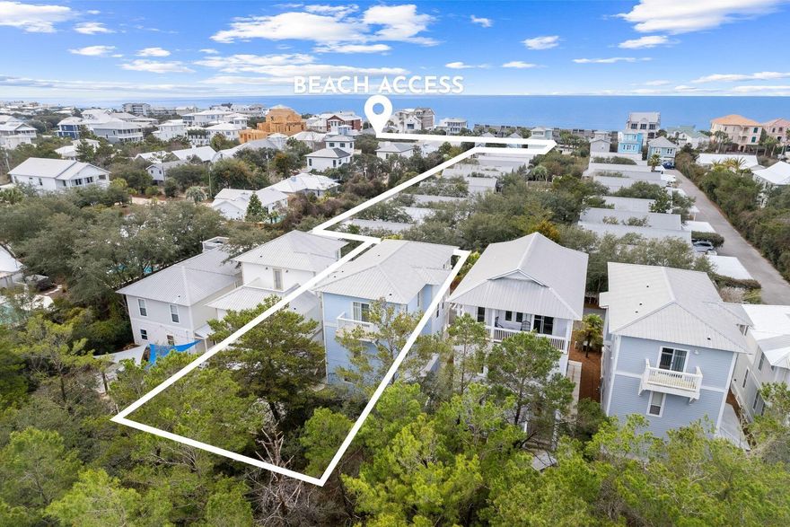 With fresh exterior paint, backing up to Camp Creek Golf Course and just steps from deeded beach access and the community pool, this beach cottage is the perfect coastal getaway or rental investment property. Steps lead to both a front entry and side entry with porches on all levels along with a private back patio delivering enviable outdoor living space for relaxing and dining in the sun. The main entry opens to a spacious living area filled with natural light, new flooring and updated furniture. The living area seamlessly flows into the dining space and newly renovated kitchen boasting a center island, ample storage and stainless steel appliances. A renovated full bathroom, laundry room and large storage closet add additional conveniences to the first level.