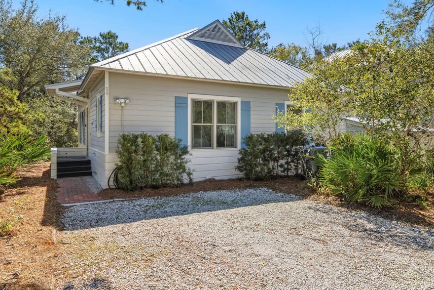 Located in Magnolia Cottages by the Sea along Scenic Highway 30A, this furnished Florida Cottage offers a desirable single-level floor plan with 3 bedrooms and 3 full bathrooms of which two are en-suites and is located close to the neighborhood pool and amenities.Designed for efficiency and flexibility, the one-story layout makes excellent use of its 1,225 square feet, making it well suited as a short-term rental, second home, or full-time residence. Interior features include hardwood flooring throughout, beadboard cabinetry, granite countertops, solid interior doors, and tile bathtub surround and shower.Exterior highlights include durable Hardie Plank siding, a spacious screened porch for comfortable outdoor living, and a private storage shed ideal for beach gear and owner storage. Magnolia Cottages by the Sea is known for its charming coastal architecture and resort-style amenities, including deeded beach access with nearby golf cart parking, a community pool and is ideally located near Waterhouse Provisions & Bottle Shop. The neighborhood is conveniently positioned along 30A, located just over a mile to Alys Beach and Rosemary Beach and a mile and a half to The Big Chill 30A and Watersound, providing easy access to dining, shopping, and entertainment without the premium pricing of town-center ownership.