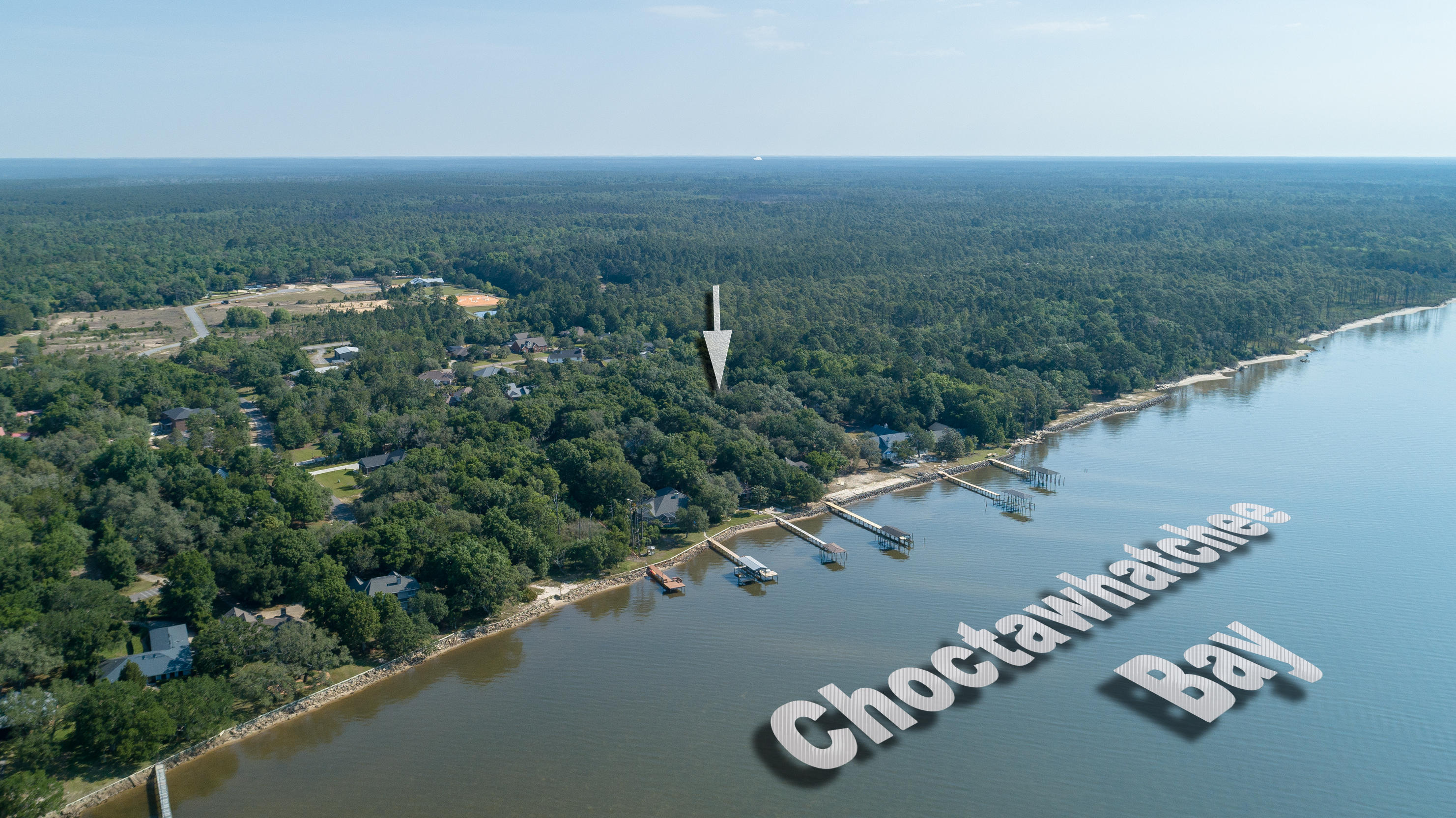 This bay front community is tucked away off Hwy 20. The vacant lot is close by the community dock and pavilion.