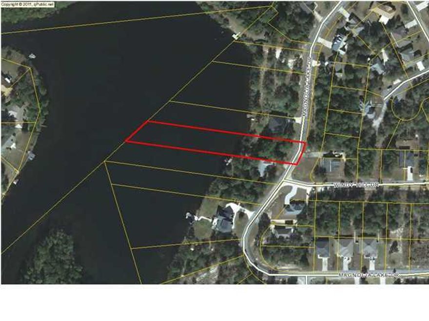 Waterfront home site. Magnolia Lake is one of Defuniak's finest subdivisions. Covenants & restrictions. Located in the city limits. All city utilities. Walking distance to the grade school, high school and children's park. One way in and one way out gives the subdivision a gated community feel. Buy now! Build later! smart investment.