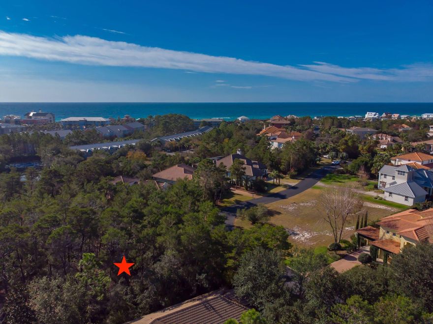 Large residential lot nestled in the prestigious gated beach community of Bella Mar at Gulf Place.  This is the only available lot at Gulf Place, a million dollar neighborhood.  Short term rentals are not allowed in Bella Mar.  Located directly across the street from the Gulf of Mexico, Bella Mar has private deeded beach access next to the Santa Rosa Golf & Beach Club.  Bella Mar is conveniently located within walking distance to some of the best local restaurants including The Vue, The Perfect Pig, and Shunk Gulley as well as fun boutiques, live music and other events in Gulf Place.