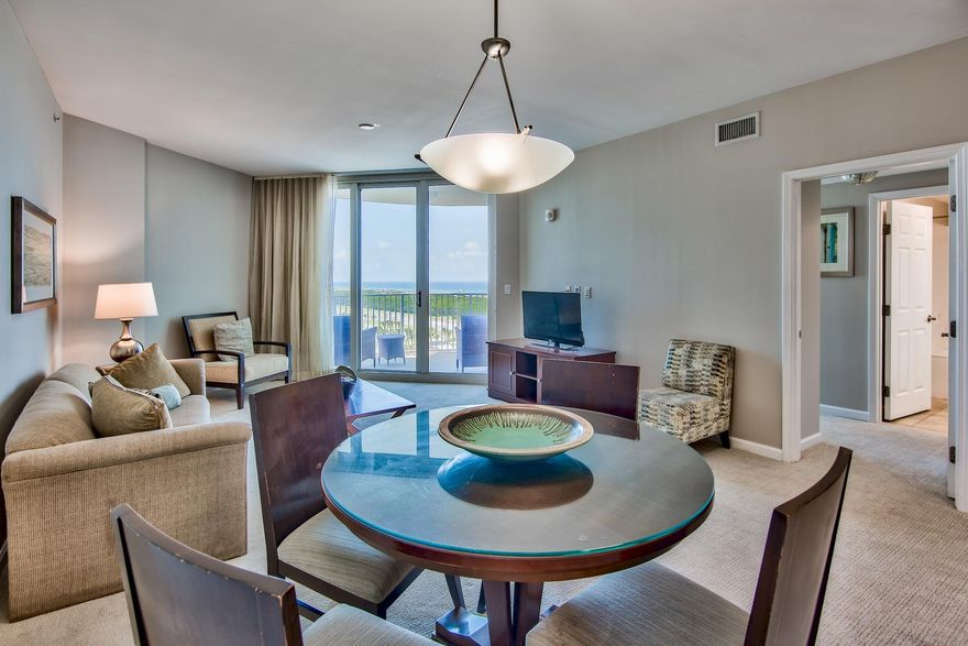 10th floor, South end unit at The Palms of Destin with stunning Gulf and Bay views! Unit has new carpet and new paint. Kitchen features granite countertops and maple cabinetry. Amenities at The Palms are first class. They include an expansive 11,000 SF lagoon pool with waterfall and spa, children's pool, playground and splash pool, lighted tennis and basketball courts, first class fitness center, seasonal shuttle service to the beach, and covered protected parking. Also on site is the conference center, office center, and reception desk. THE ASSOCIATION FEES INCLUDE ALL UTILITIES, INCLUDING ELECTRICITY, WATER, CABLE, INTERNET, AND LOCAL PHONE SERVICE. Buyer to please verify all information including square footage, room dimensions, and all else.