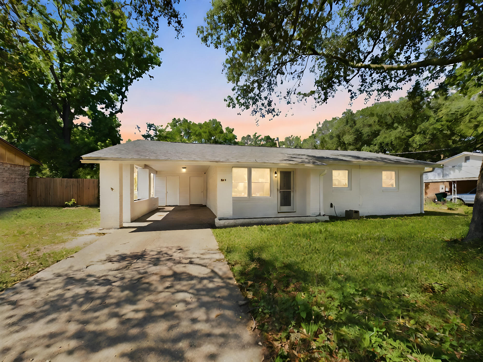 This charming brick home features four bedrooms and two bathrooms, ideally situated in a prime location with plenty of amenities. The interior includes two distinct living spaces, a split bedroom layout, and a generous family room. The kitchen is equipped with Quartz countertops, a gas stove, and tiled floors. The master suite comes with a full bathroom and a walk-in shower. Outside, you'll find a large fenced yard, a spacious patio with a gas hook-up perfect for barbecues, and a 16x20 steel storage shed with electricity. Roof, HVAC, and HWH all replaced in the last 4 years and the roof permit has been closed out. This neighborhood has no HOA! Don't miss the opportunity to see this home--schedule your tour today.