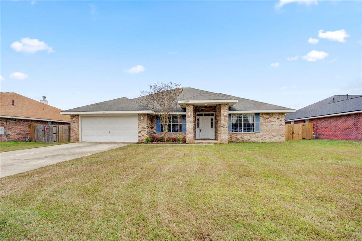 Don't miss this beautiful home in Pensacola. This spacious 4 bedroom, 3 bath, all brick, no carpet home is a must see!! TWO living room spaces that allows for endless possibilities. Great open concept that is ideal for entertaining. This home has a split floor plan. The spacious kitchen has plenty of storage space and a pantry. Located by shopping, schools and dinning.