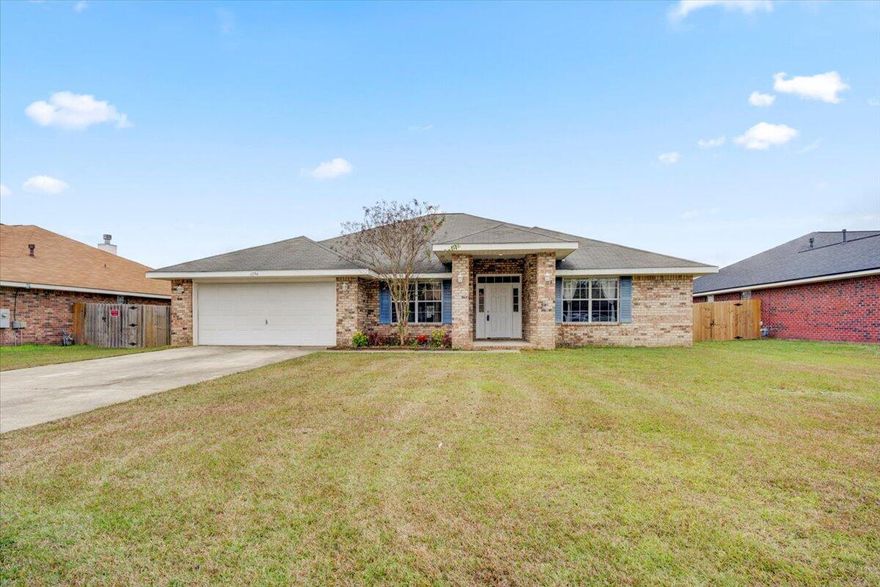 Don't miss this beautiful home in Pensacola. This spacious 4 bedroom, 3 bath, all brick, no carpet home is a must see!!  TWO living room spaces that allows for endless possibilities.  Great open concept that is ideal for entertaining.  This home has a split floor plan.  The spacious kitchen has plenty of storage space and a pantry.  Located by shopping, schools and dinning.