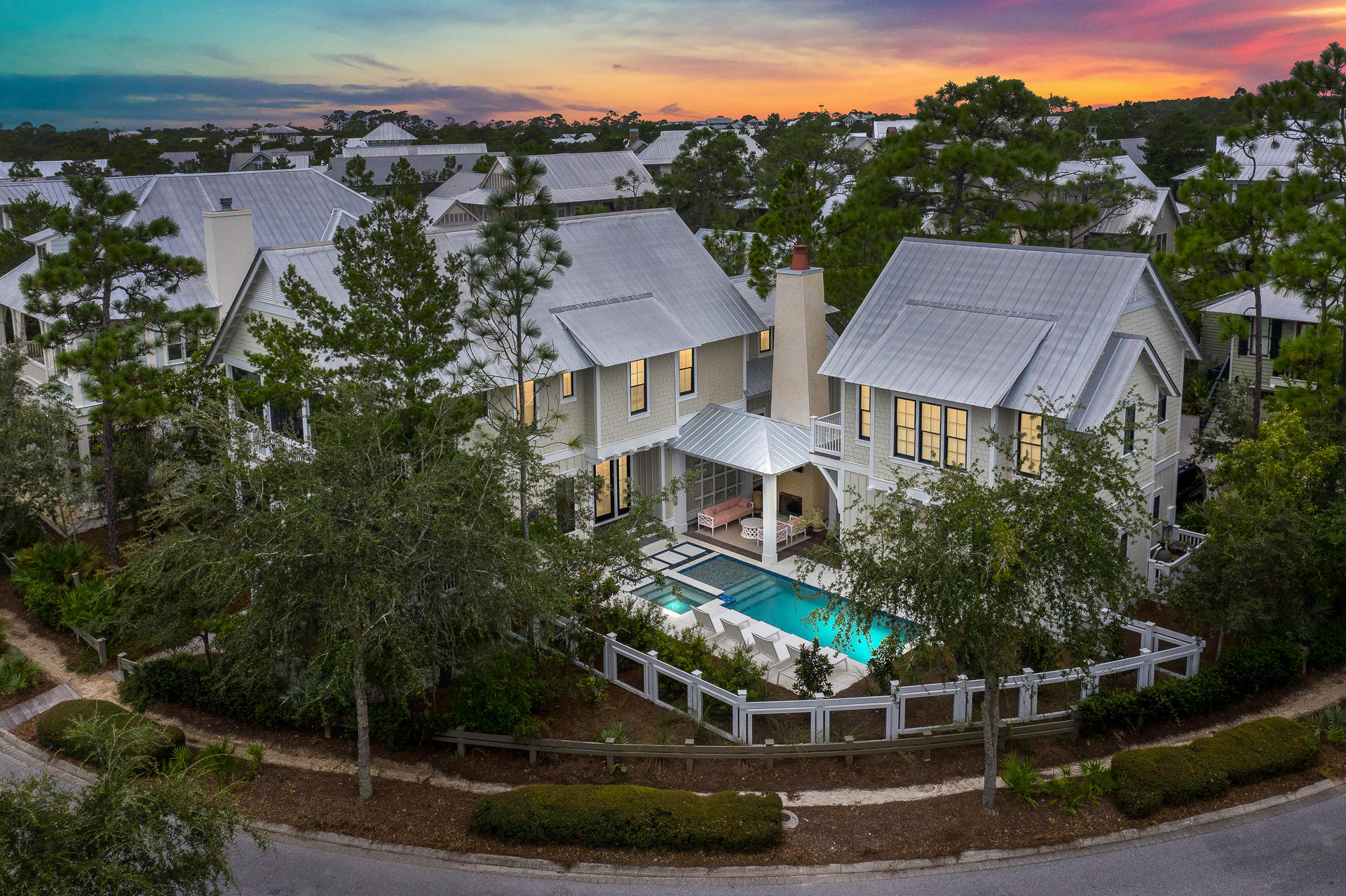 This one-of-a-kind home in WaterColor's Lake District is situated on a corner lot that offers more space than most. This great lot features a four bedroom home with a master on the main level, two living rooms, a bunk room and a carriage house with separate bedroom, above the two car garage. Recently remodeled in 2019 by Jason Romair, this home offers exquisite and modern upgrades throughout the entire property. A private pool cabana, and spa were added to the courtyard making this home the perfect beach house for entertaining. 202 Bluejack has never been on a rental program and has remained impeccable condition.