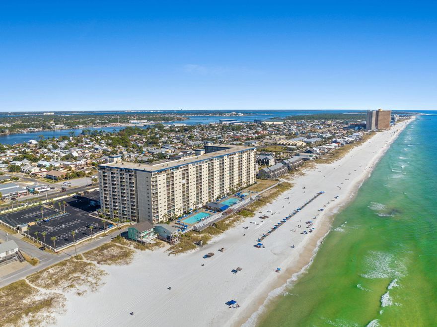 Nice 3 bedroom 2 bath resort condo with a westward view from the main bedroom and balcony.  This is an income producing condo with two swimming pools, hot tub, tiki bar & grill, beach access all for you and your guests enjoyment.